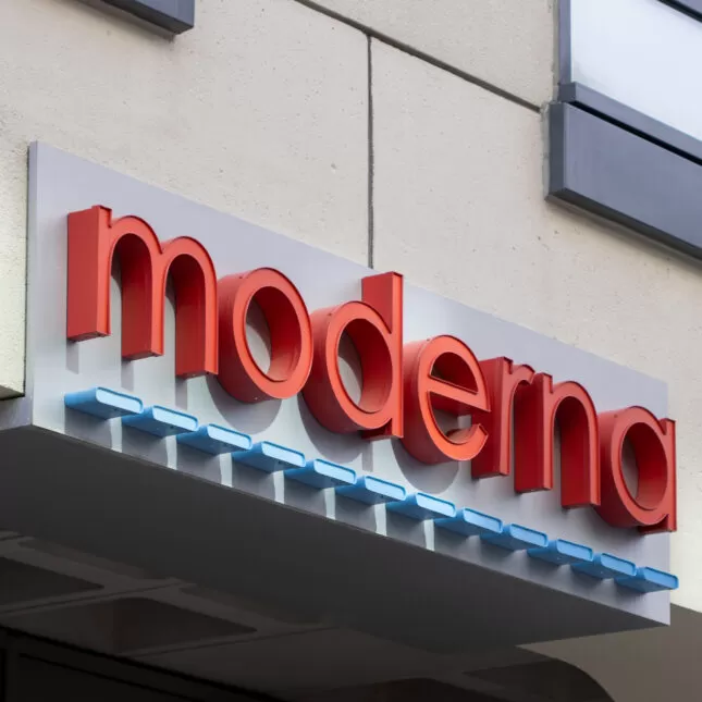 Syringe preparing a vaccine dose from a vial