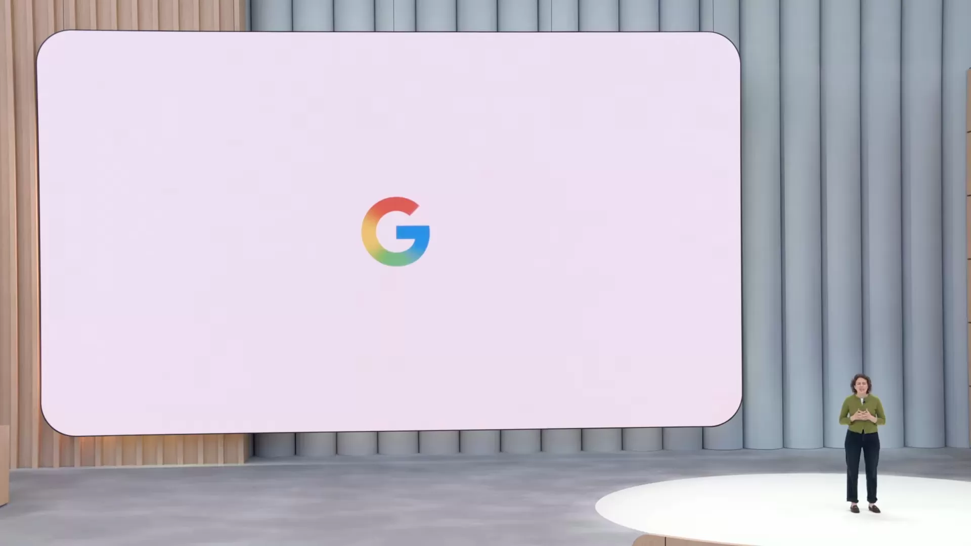 New Google 'G' logo displayed on screen during a technology keynote presentation.