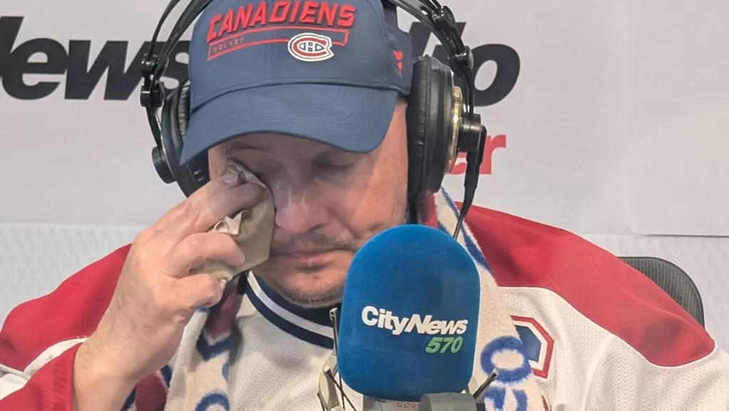 Mike Farwell reacts after eating spicy wings during the Farwell4Hire cystic fibrosis fundraiser