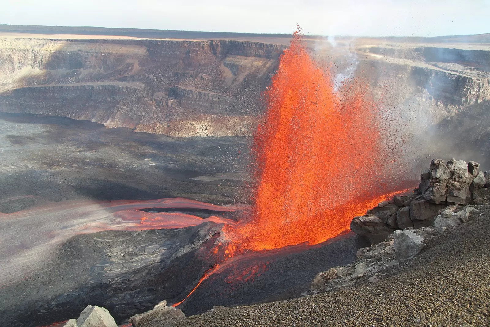 Kilauea volcano lava fountain, potentially showing gold-rich magma escaping Earth's core