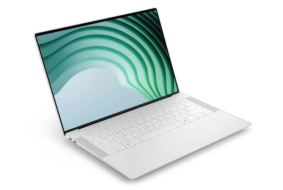 Dell 14 Premium laptop in Platinum finish, showing the sleek design and thin screen bezels.