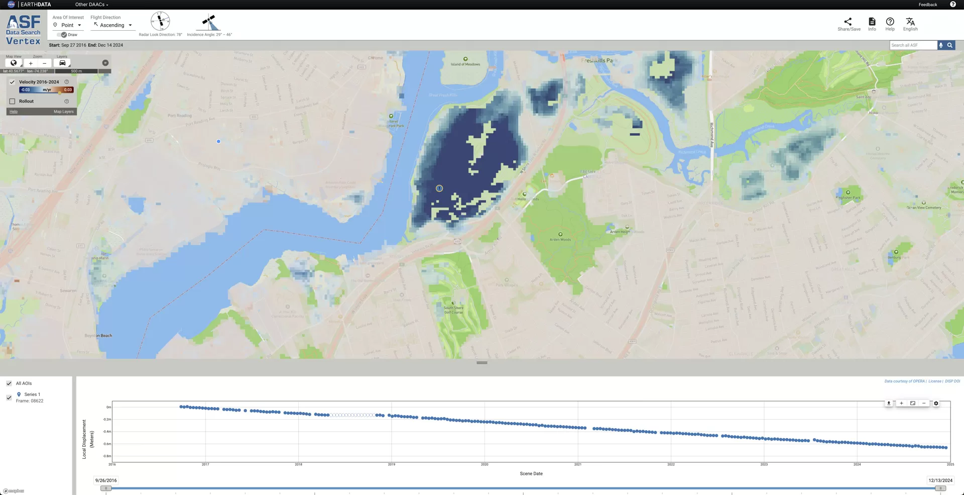 Map showing blue dot on a landfill in Staten Island, NY, indicating land subsidence