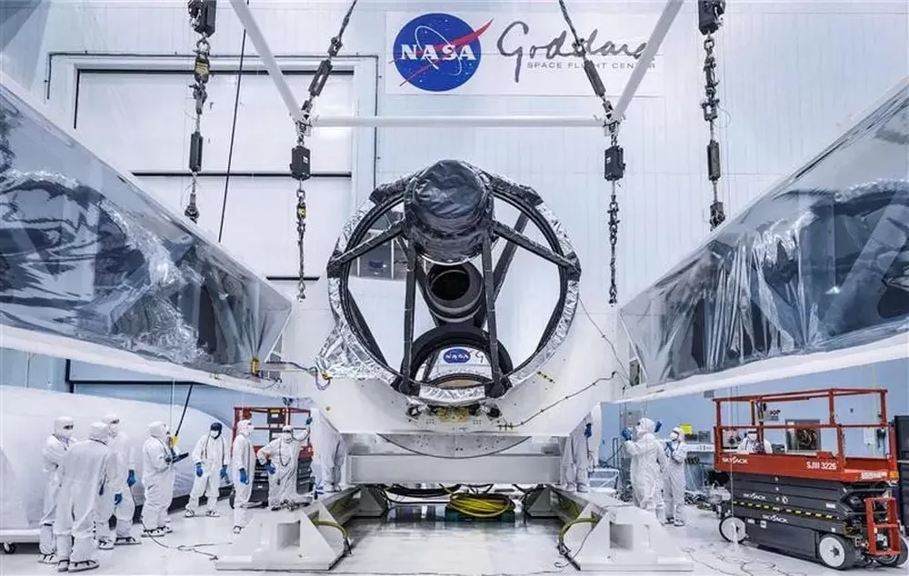 NASA's Nancy Grace Roman Space Telescope hardware, the Optical Telescope Assembly, being prepared in a clean room