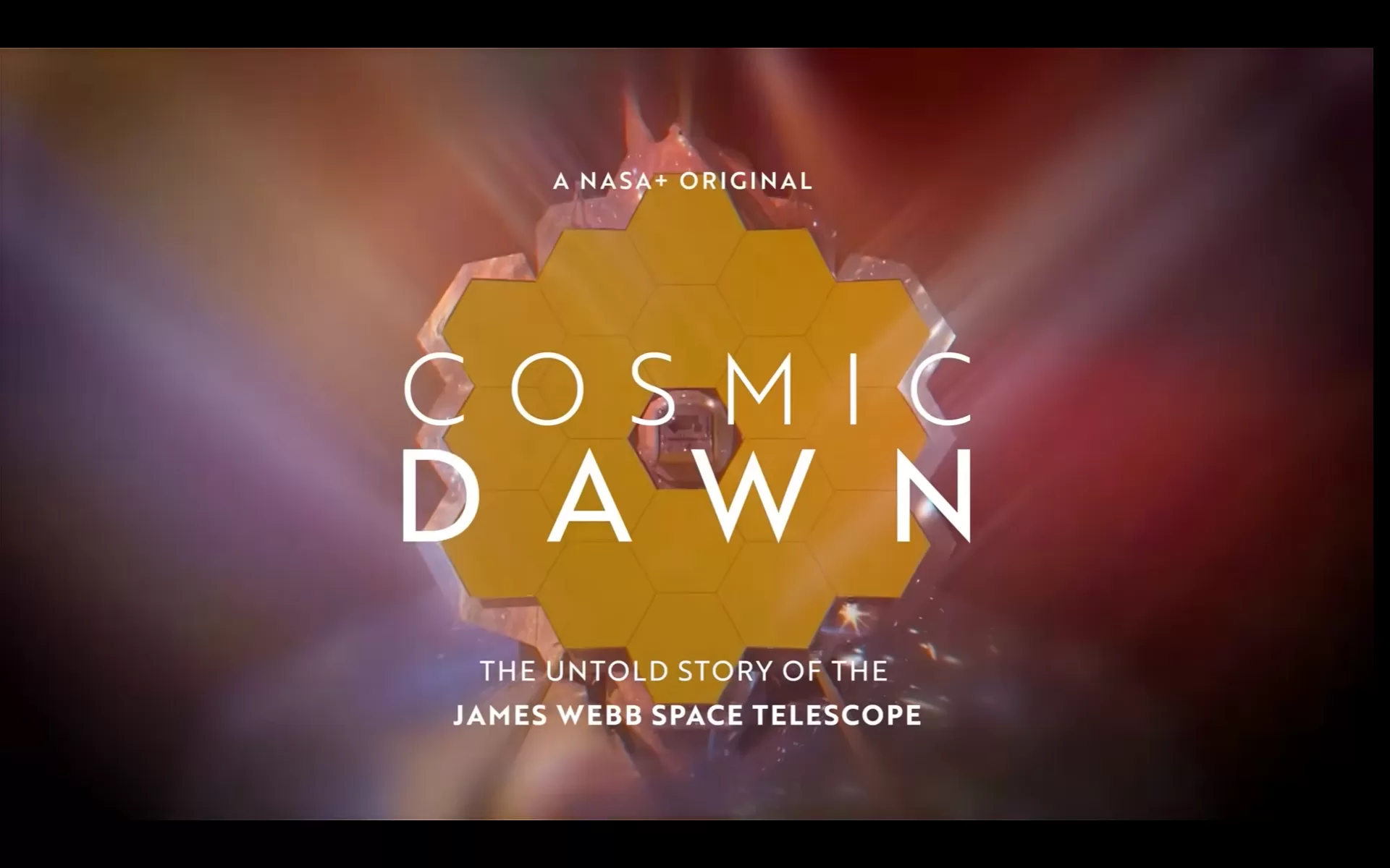 Behind-the-scenes view from the "Cosmic Dawn" documentary trailer, showing the complex assembly challenges of the James Webb Space Telescope.